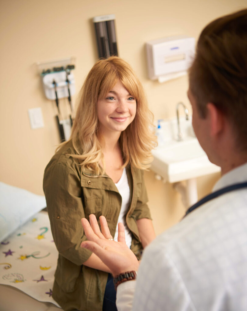 male-doctor-talking-to-female-patient
