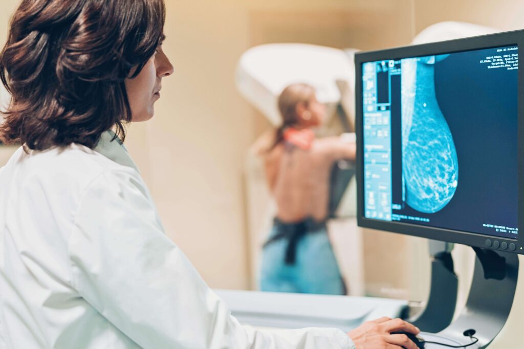 Solving women's health issues Doctor and patient making a mammography