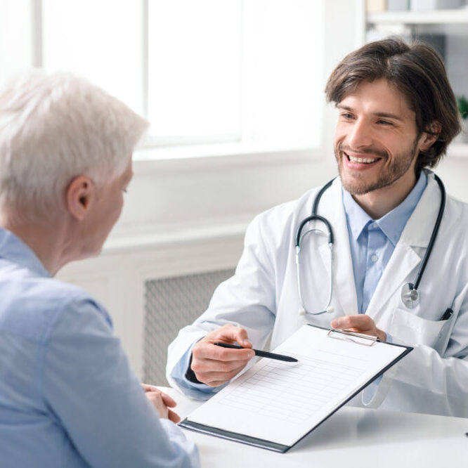Doctor presenting Direct Health to patient